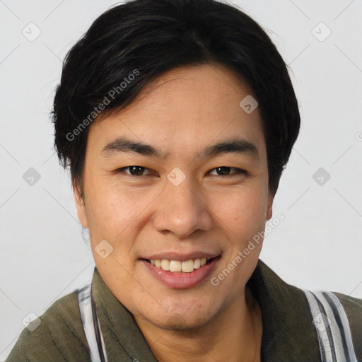 Joyful asian young-adult male with short  black hair and brown eyes