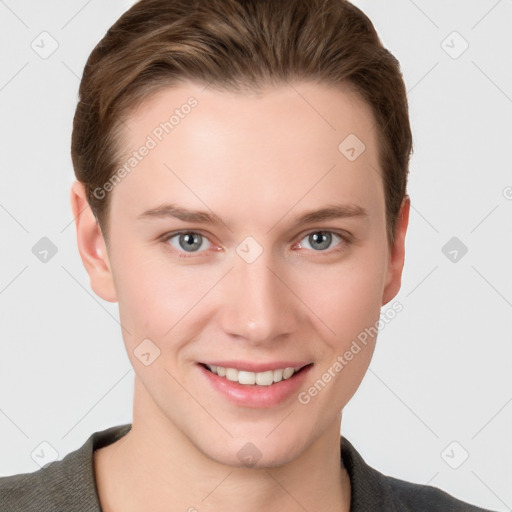 Joyful white young-adult female with short  brown hair and grey eyes