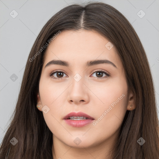 Neutral white young-adult female with long  brown hair and brown eyes