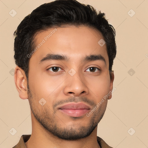 Joyful latino young-adult male with short  brown hair and brown eyes