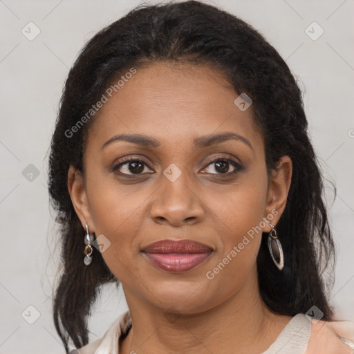 Joyful black adult female with medium  brown hair and brown eyes