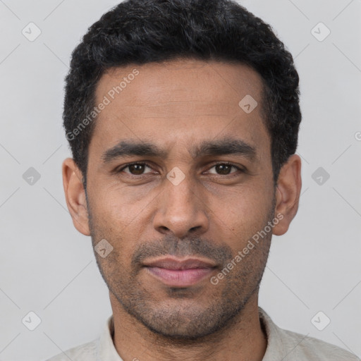 Neutral latino young-adult male with short  black hair and brown eyes