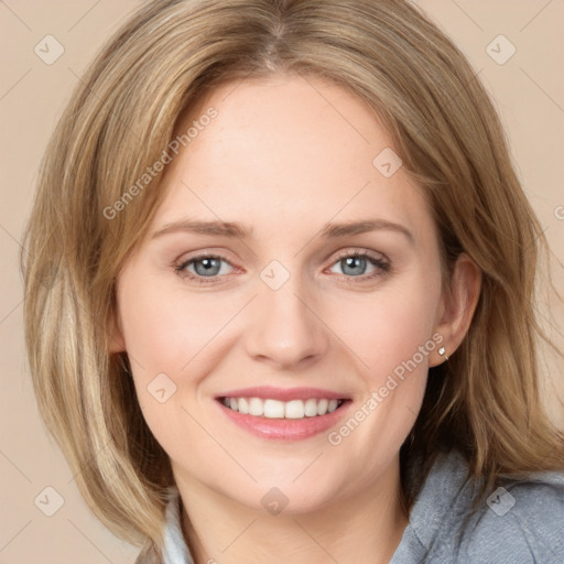 Joyful white young-adult female with medium  brown hair and blue eyes