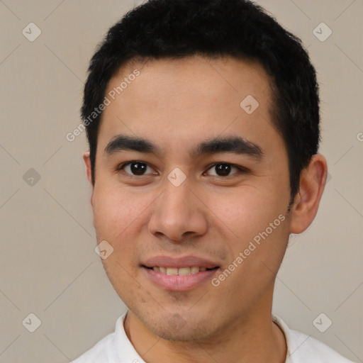 Joyful latino young-adult male with short  black hair and brown eyes