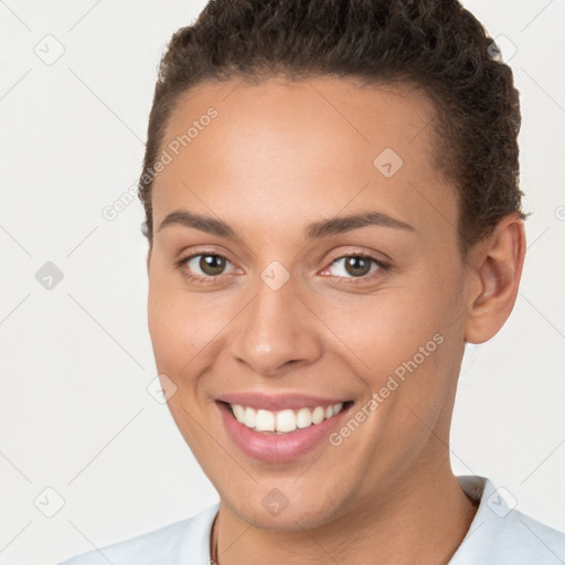 Joyful white young-adult female with short  brown hair and brown eyes