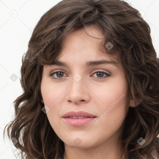 Joyful white young-adult female with long  brown hair and green eyes