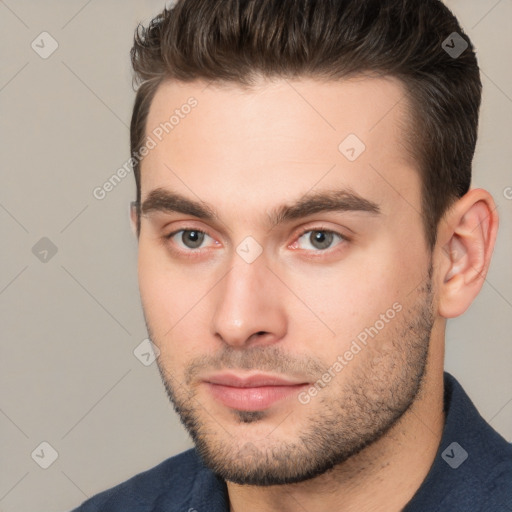 Neutral white young-adult male with short  brown hair and brown eyes