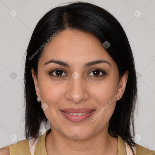 Joyful latino young-adult female with medium  brown hair and brown eyes