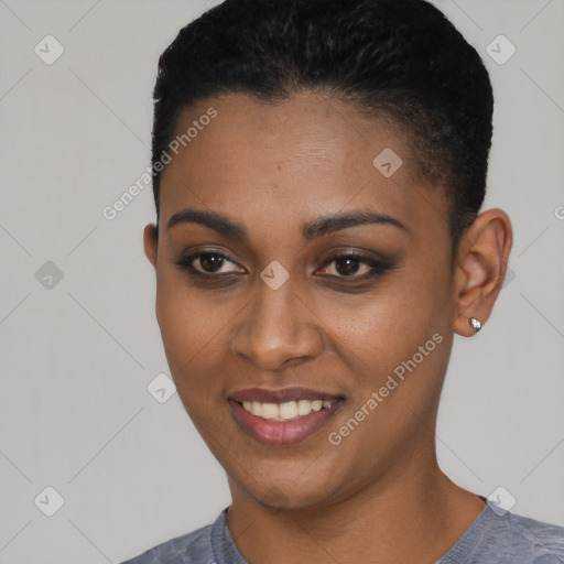 Joyful black young-adult female with short  black hair and brown eyes