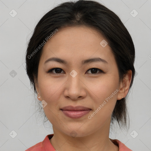 Joyful asian young-adult female with medium  brown hair and brown eyes