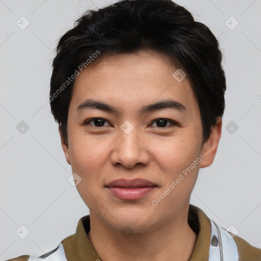Joyful asian young-adult male with short  black hair and brown eyes