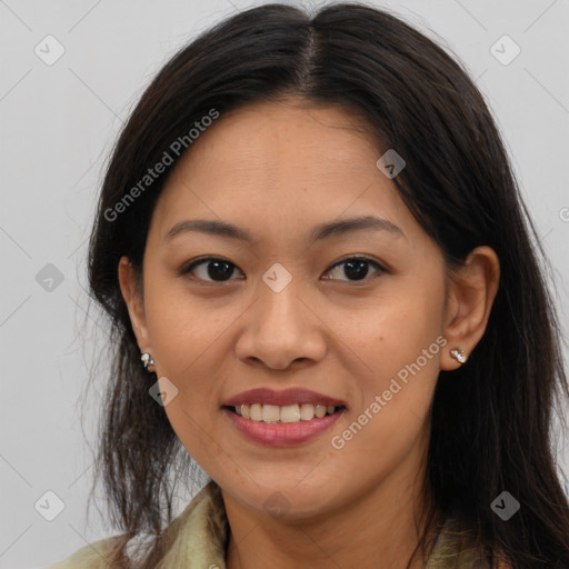 Joyful asian young-adult female with long  brown hair and brown eyes