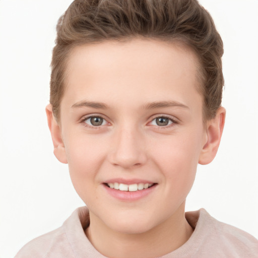 Joyful white child female with short  brown hair and grey eyes