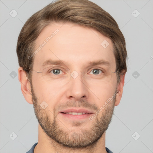 Joyful white adult male with short  brown hair and grey eyes