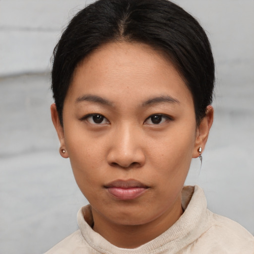 Neutral asian young-adult female with short  brown hair and brown eyes