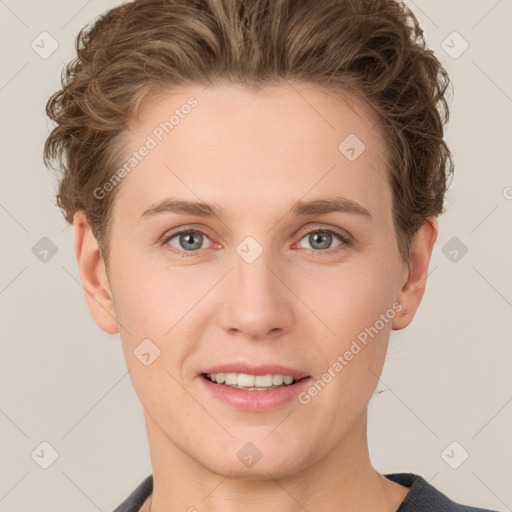 Joyful white young-adult female with short  brown hair and grey eyes