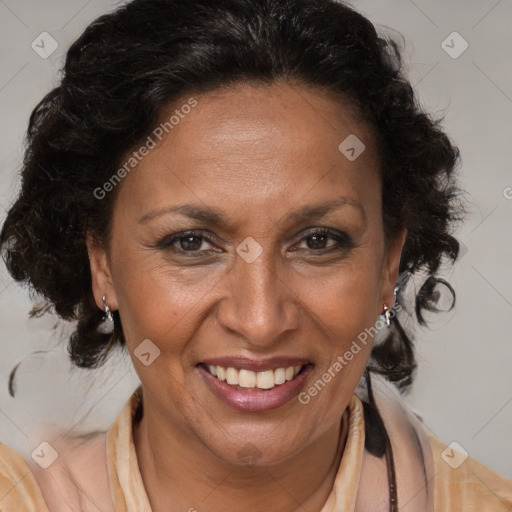 Joyful black adult female with medium  brown hair and brown eyes