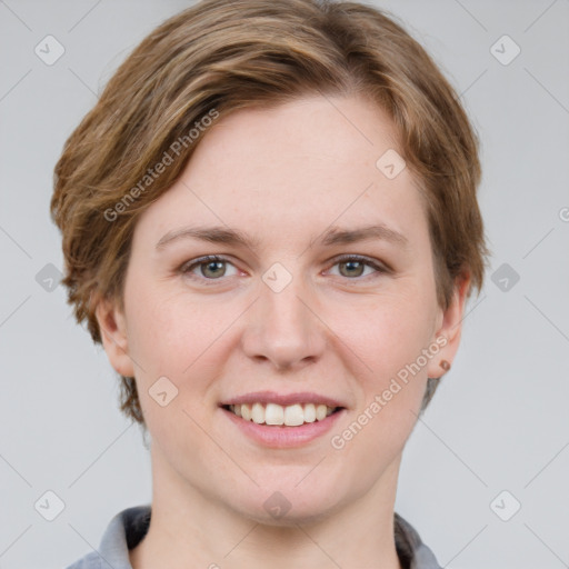 Joyful white young-adult female with short  brown hair and grey eyes