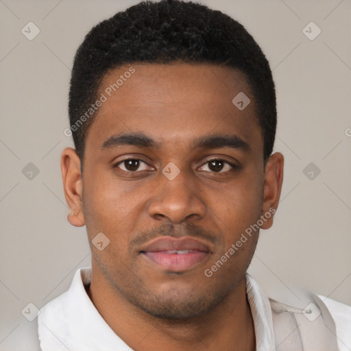 Joyful latino young-adult male with short  brown hair and brown eyes