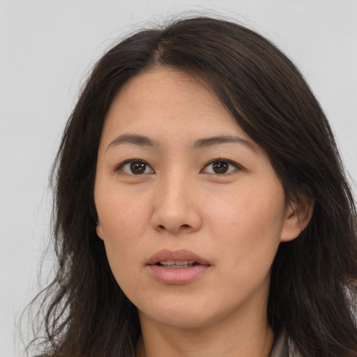 Neutral asian young-adult female with long  brown hair and brown eyes