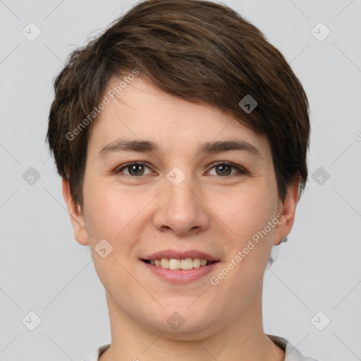 Joyful white young-adult female with short  brown hair and grey eyes