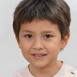 Joyful white child male with short  brown hair and brown eyes