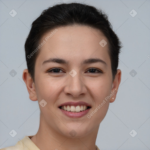 Joyful white young-adult female with short  brown hair and brown eyes