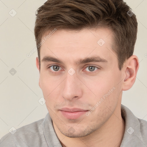 Neutral white young-adult male with short  brown hair and grey eyes