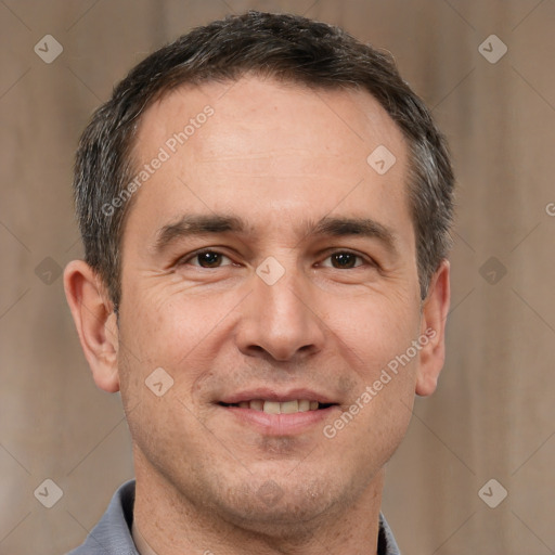 Joyful white adult male with short  brown hair and brown eyes