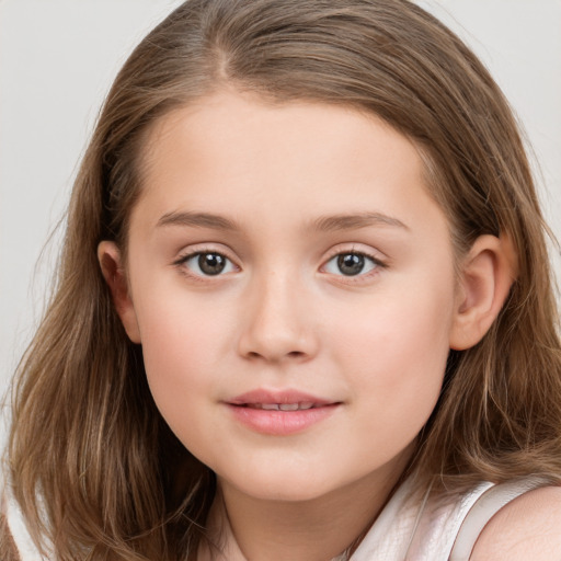 Joyful white child female with long  brown hair and brown eyes