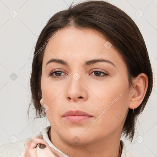 Neutral white young-adult female with medium  brown hair and brown eyes