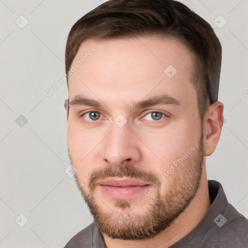 Neutral white young-adult male with short  brown hair and grey eyes