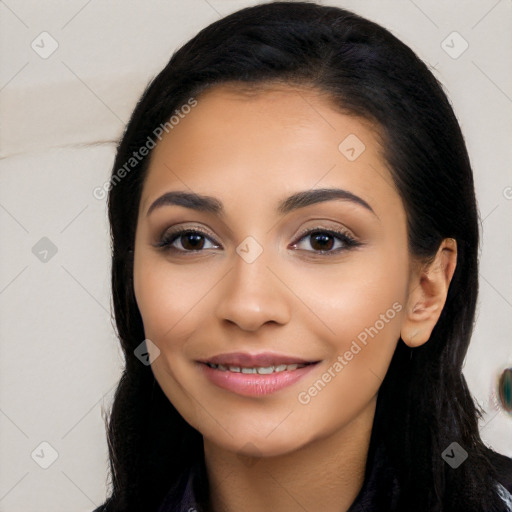 Joyful latino young-adult female with long  black hair and brown eyes