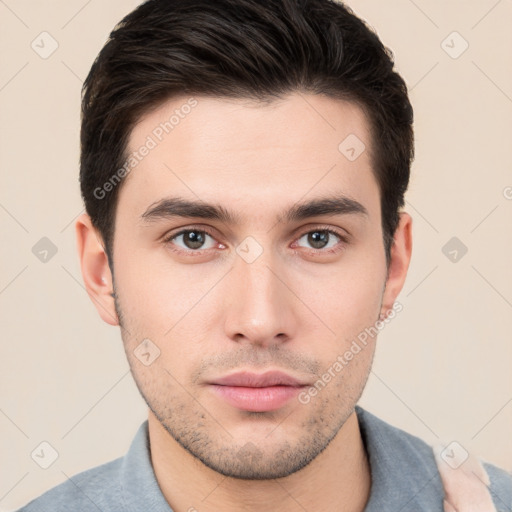 Neutral white young-adult male with short  brown hair and brown eyes