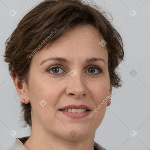 Joyful white adult female with medium  brown hair and grey eyes