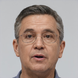 Neutral white middle-aged male with short  brown hair and brown eyes