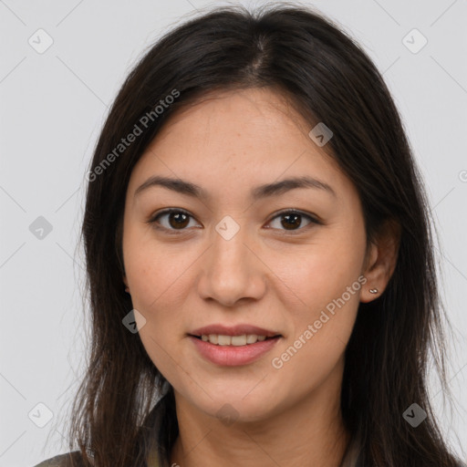 Joyful latino young-adult female with long  brown hair and brown eyes