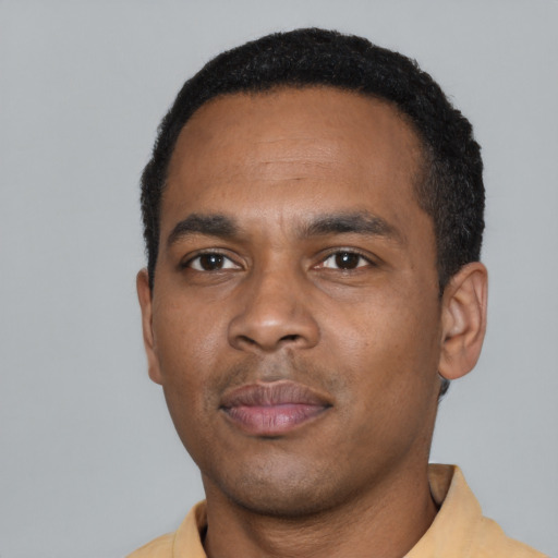 Neutral black young-adult male with short  black hair and brown eyes
