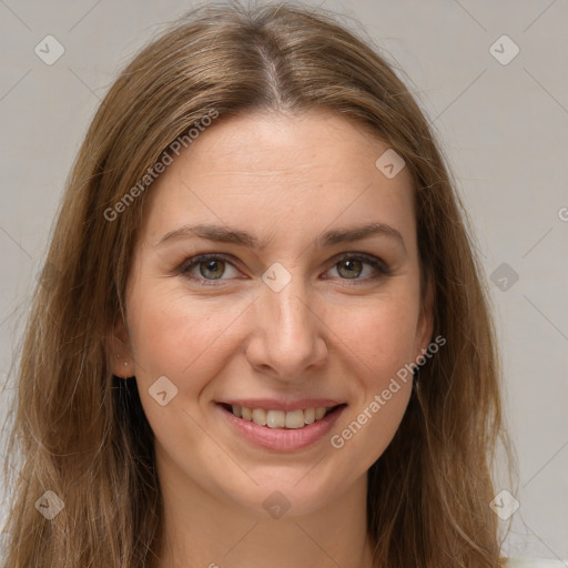 Joyful white young-adult female with long  brown hair and grey eyes