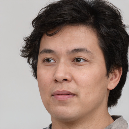 Neutral white adult male with medium  brown hair and brown eyes