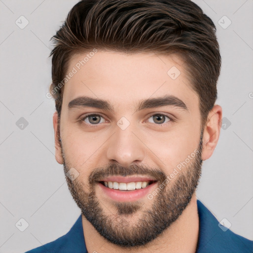 Joyful white young-adult male with short  brown hair and brown eyes