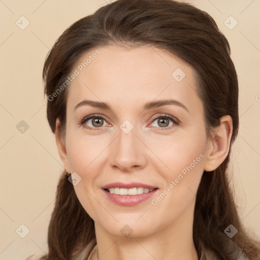 Joyful white young-adult female with long  brown hair and brown eyes