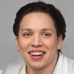 Joyful white adult female with short  brown hair and brown eyes