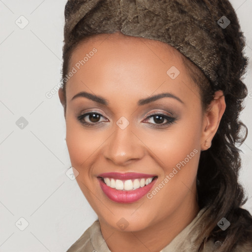 Joyful latino young-adult female with long  brown hair and brown eyes