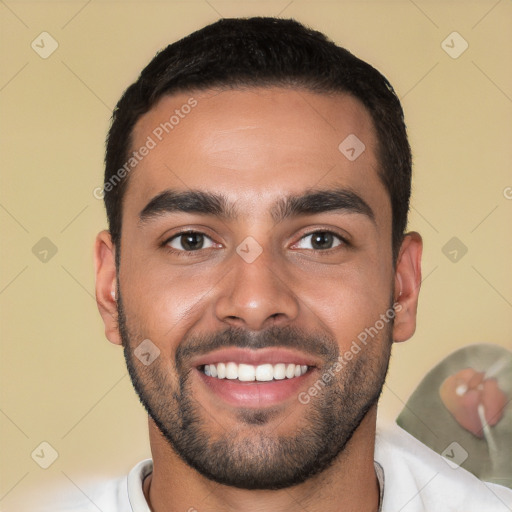 Joyful white young-adult male with short  black hair and brown eyes