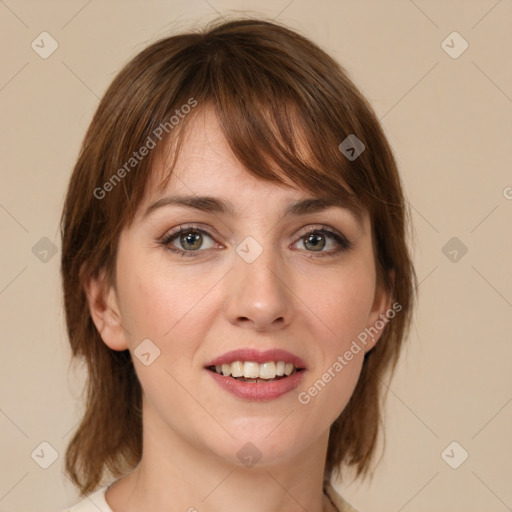 Joyful white young-adult female with medium  brown hair and green eyes