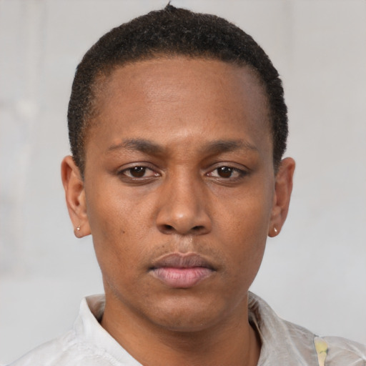 Neutral latino young-adult male with short  brown hair and brown eyes