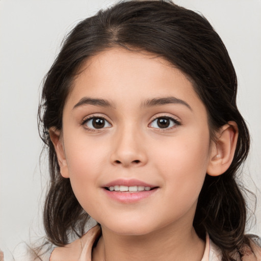 Joyful white child female with medium  brown hair and brown eyes