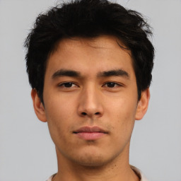 Neutral asian young-adult male with short  brown hair and brown eyes