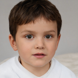 Neutral white child male with short  brown hair and brown eyes